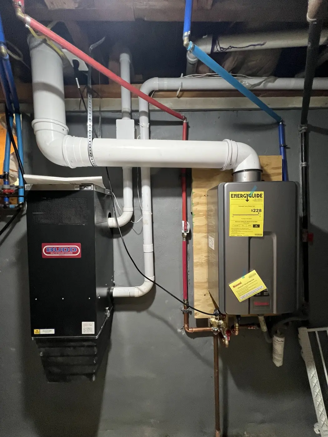 Rinnai wall-mounted tankless water heater installed by Even Flow Inc.